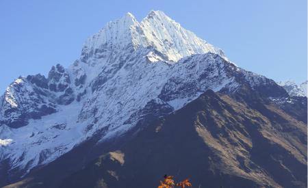 Two white Himalaya peaks, almost resemling a fish tail.