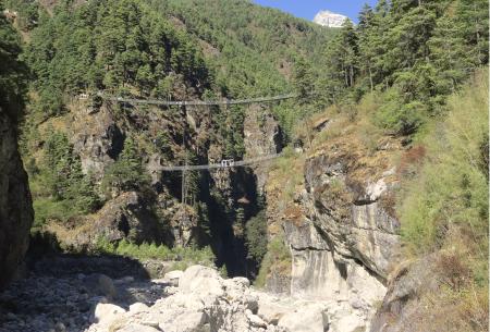 The two Hilary bridges, seen on a rocky gorge in the distance.