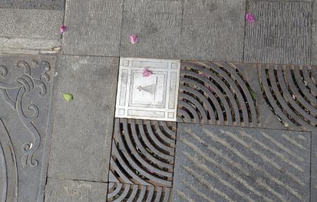 A drainage lid depicting the chaitya.