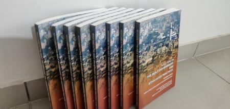 Multiple copies of the book 'Reflections On The Built Environment And Associated Practises'